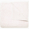 A white and pink Organic Hand Stitched Lotus Quilt with dots, by John Robshaw.