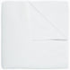 An Organic Hand Stitched White Quilt by John Robshaw folded on top of a white surface.
