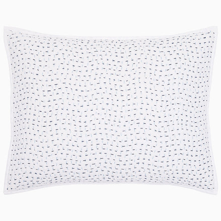 Introducing the Organic Hand Stitched Light Indigo Sham from John Robshaw, crafted from soft organic cotton voile. This sham features elegant navy and light blue dash embroidery and is finished with a flanged border, making it a stunning addition to any cotton bedding collection.
