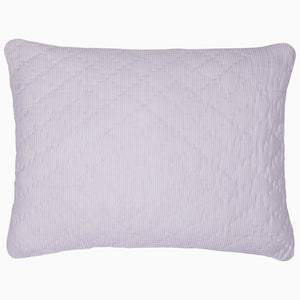 A John Robshaw Nandi Lavender Quilt featuring block printing on a white cotton background.
