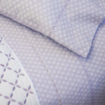 A close up of a Bindi Lavender Organic Sheet Set by John Robshaw. - 30784334659630
