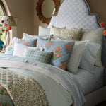 A Cinde Sage Organic Duvet by John Robshaw with a blue and orange comforter and pillows made from 200 thread count organic long staple cotton. - 30784322469934