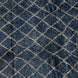 Dark blue handwoven Blue Village Wool Rug by John Robshaw with a white diamond grid pattern.