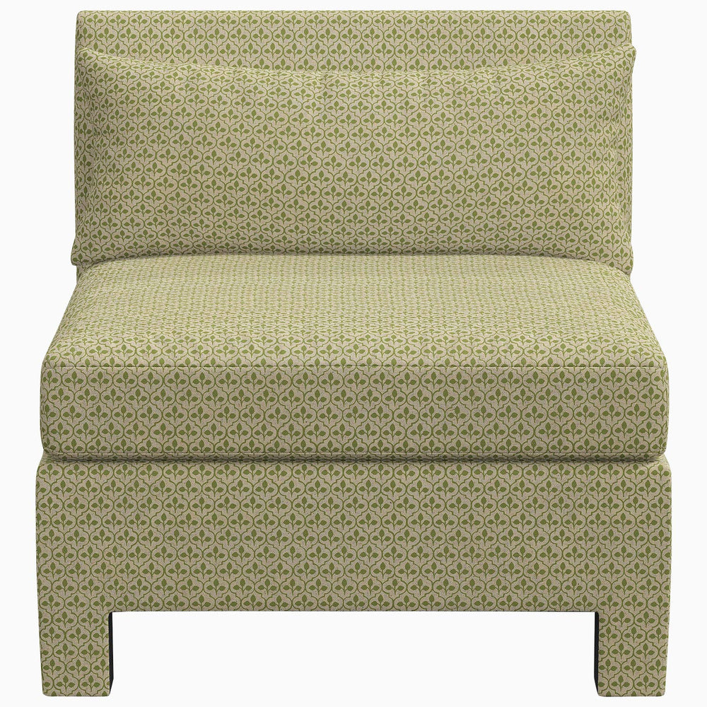 The John Robshaw Sameera Armless Chair, with its exclusive green upholstered fabric and cushion, offers a unique seating arrangement.