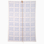 A rectangular Jaya Azure Chik Blind by John Robshaw Textiles features a blue leaf pattern on a white background, split by a central zipper. - 31879864090670