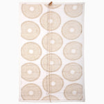 The Lapis Sand Chik Blinds by John Robshaw Textiles feature a white rectangular fabric panel with beige circular designs, similar to the style of John Robshaw blinds, and a brown rope hanging down the center. - 31884734496814