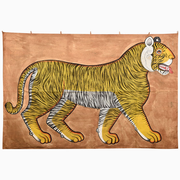 A rectangular Prowling Tiger Tapestry by John Robshaw featuring an Iqbal Tiger in profile with a striped body, bared teeth, and a protruding tongue, set against a solid tan background.