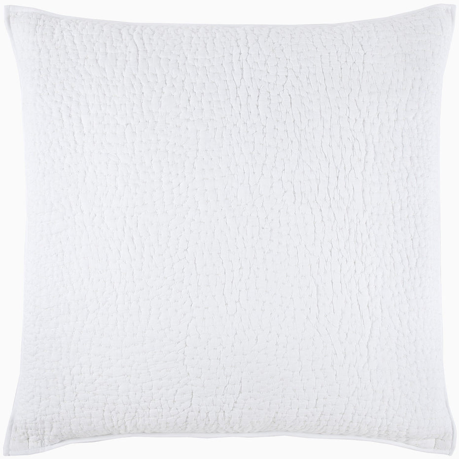 A John Robshaw white pillow featuring the Organic Hand Stitched White Quilt.