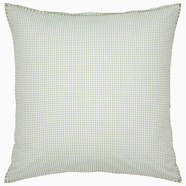 An organic long staple cotton pillow with dots on it (Cinde Sage Organic Duvet by John Robshaw).