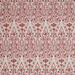 A red and white floral pattern inspired by Mughal gardens, featuring the Marmar Berry Performance Fabric by John Robshaw.