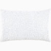 A John Robshaw Organic Hand Stitched Light Indigo Quilt with blue dots.
