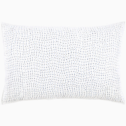 A John Robshaw Organic Hand Stitched Light Indigo Quilt with blue dots.