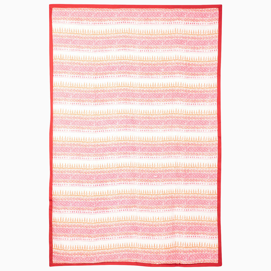 John Robshaw Crimson Bloom Suzani Blanket: a rectangular blanket with an embroidered vintage floral design, horizontal bands of pink and orange patterns, and a solid red border.