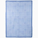 Jaipur Twilight Suzani Blanket featuring a blue and white geometric grid pattern with embroidered botanical motifs and a solid blue border.