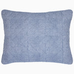 A Nandi Indigo Quilt pillow with simple stripes by John Robshaw.