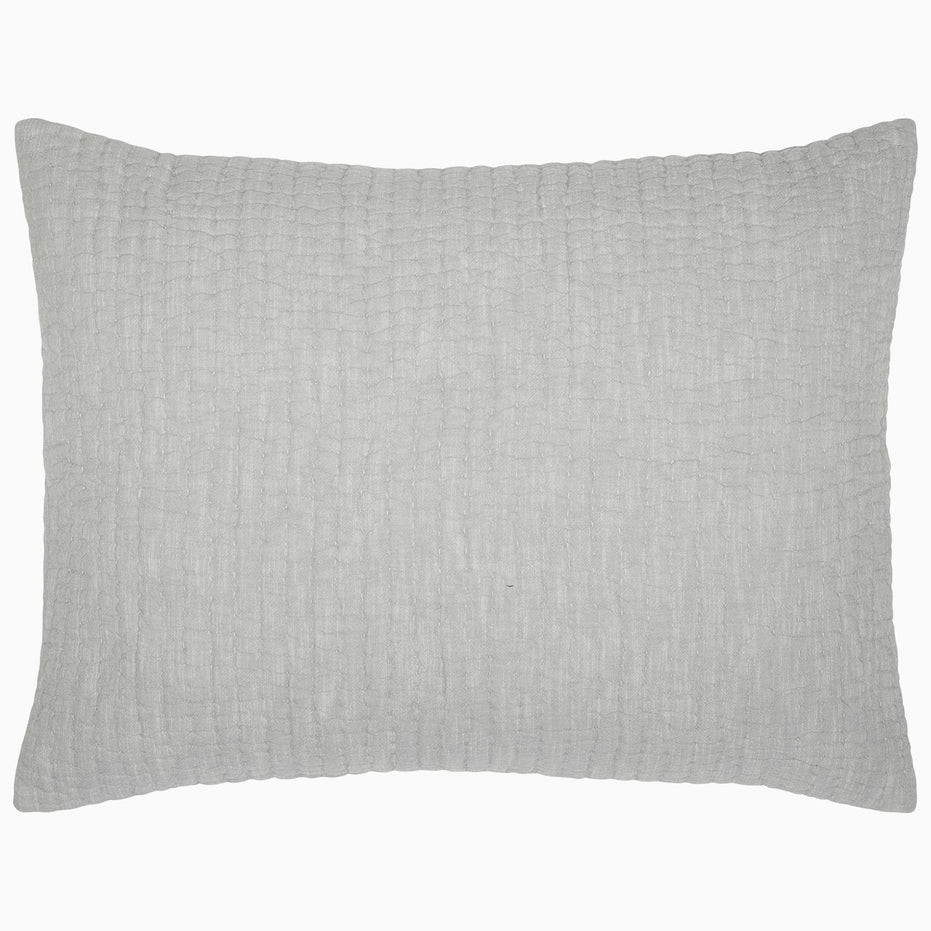 A Vivada Light Gray Woven Quilt with a cotton chambray coverlet on a white background. (Brand Name: John Robshaw)