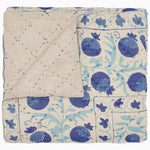 A Tejal Azure Throw from Throws, with diamond pattern stitching on it. - 30395669610542