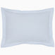 The Cinde Light Indigo Organic Duvet by John Robshaw is a rectangular pillow with a light blue and white patterned cover, featuring a 200 thread count percale with small repeated designs and a flanged edge.