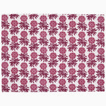 The Sabah Berry Placemats (Set of 4) by John Robshaw feature a repeating pattern of red block-printed floral shapes with leaves on a white background, made in India. - 31272676786222