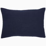 A rectangular Zain Kidney Pillow in navy blue with a plain design, crafted from cotton linen by John Robshaw. - 31272657158190