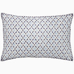 The Sanya Indigo Kidney Pillow by John Robshaw is a rectangular pillow adorned with a geometric blue and white pattern, showcasing diamond and dot designs with intricate French knot details. - 31272612331566