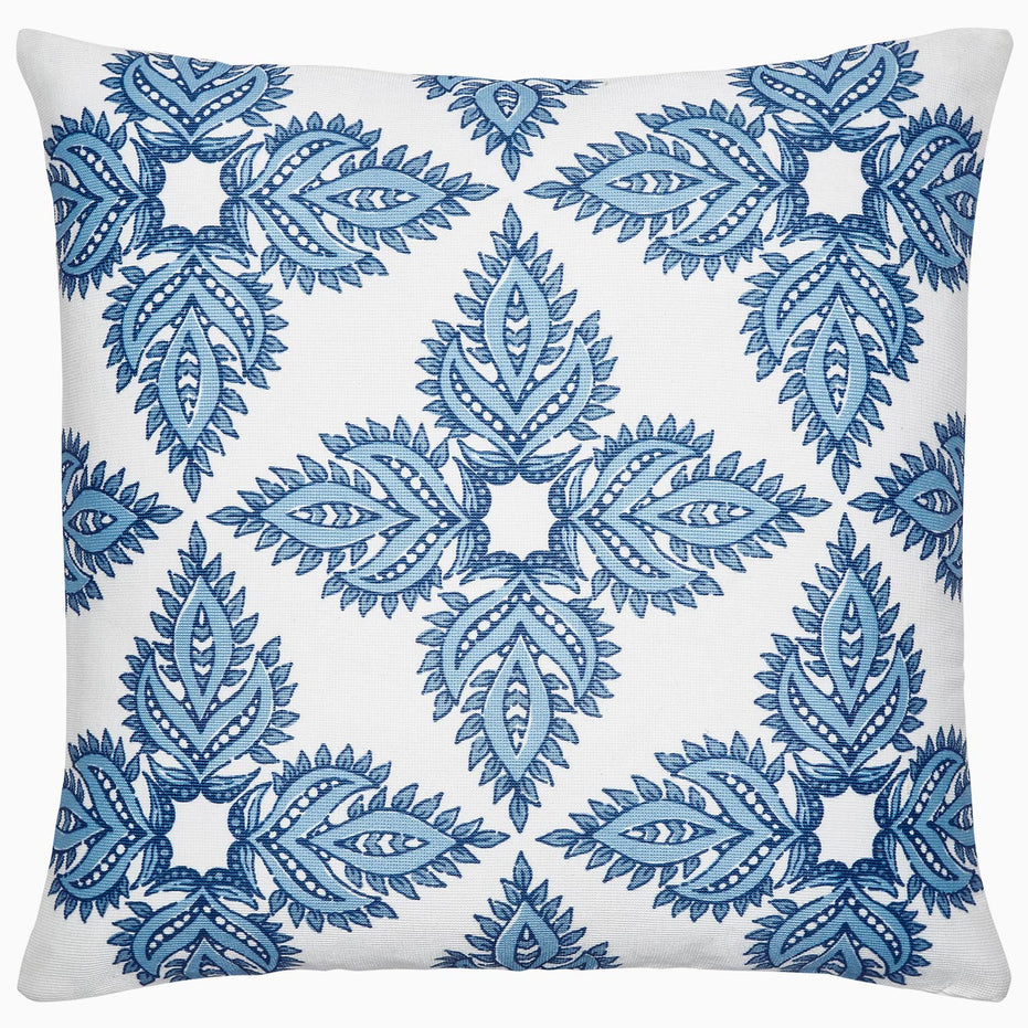 A Maira Indigo outdoor decorative pillow by John Robshaw with a floral pattern.