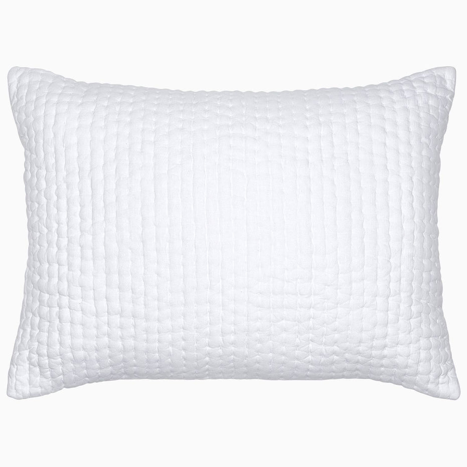 A Vivada White Woven Quilt pillow with hand stitching on a white background by John Robshaw.