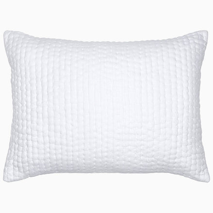 A Vivada White Woven Quilt pillow with hand stitching on a white background by John Robshaw.