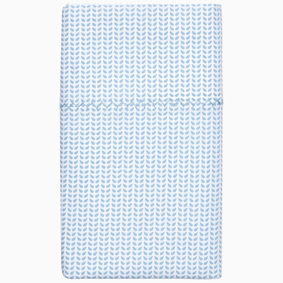 A Cinde Light Indigo Organic Sheet Set by John Robshaw, with a chevron pattern made from 100% cotton percale.