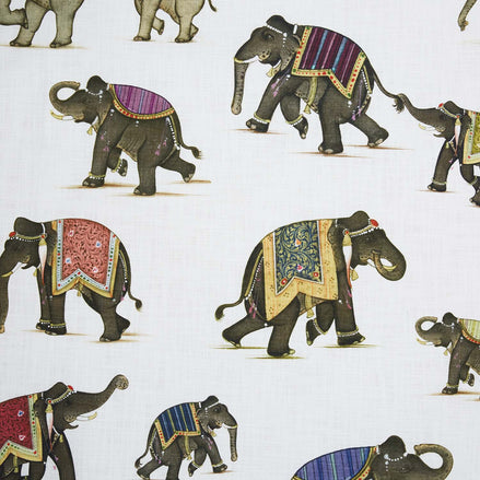 A Gaja Graphite Fabric depicting elephants in a block print design by John Robshaw.