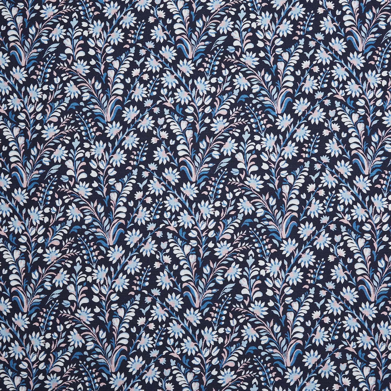 A Valli Indigo Fabric by John Robshaw, a blue and white floral printed fabric known for its handmade quality.
