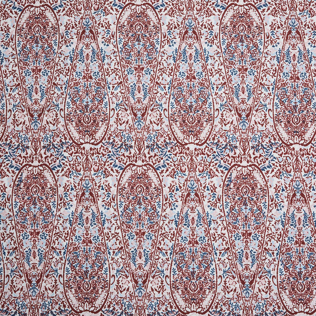 A John Robshaw Ishya Teak Fabric with a red and blue paisley print.