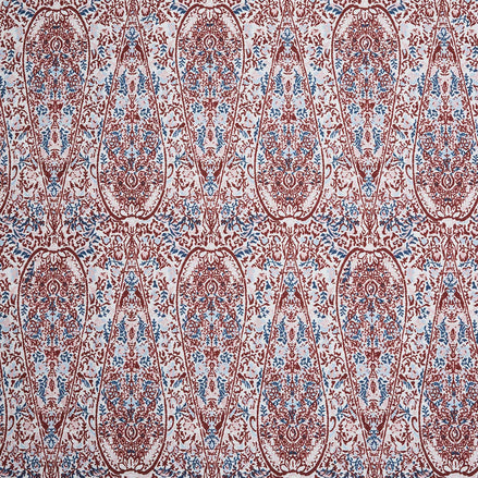 A John Robshaw Ishya Teak Fabric with a red and blue paisley print.