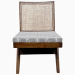 A John Robshaw Armless Easy Chair in Faris Gray with a woven seat. - 29410468495406