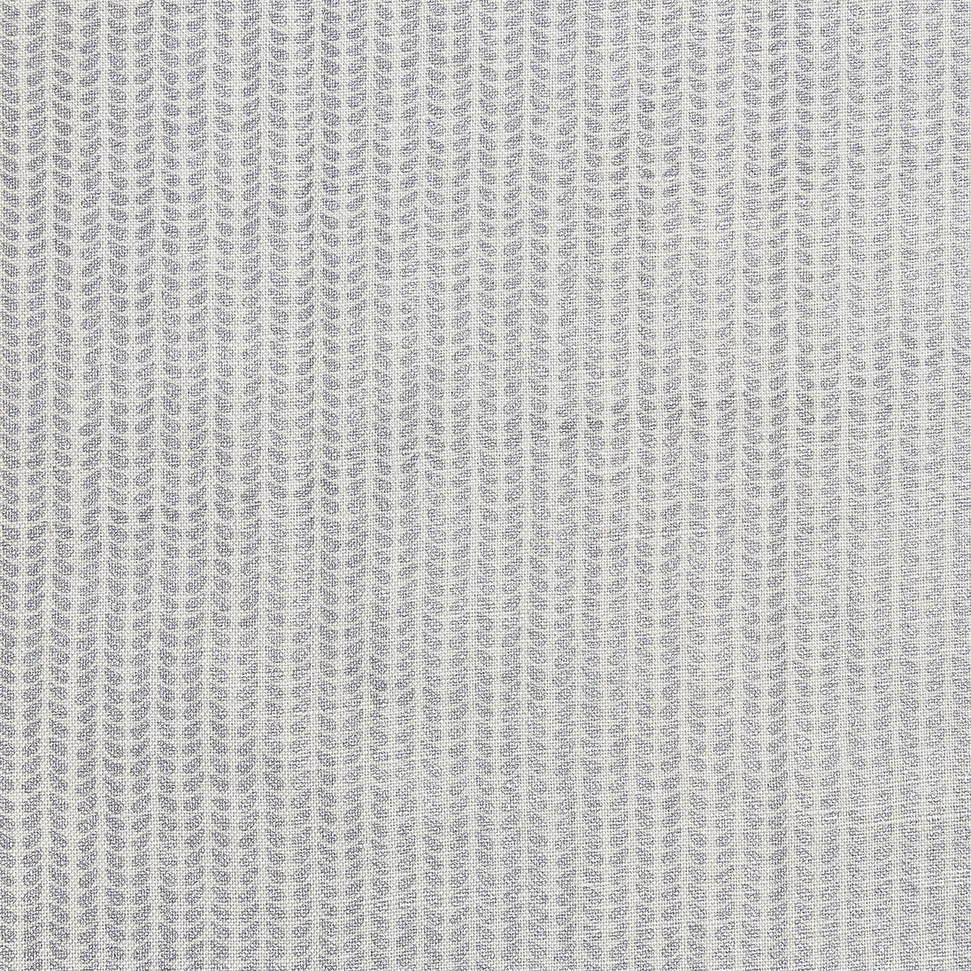 A close up image of a hand block printed John Robshaw Aleppo Silver Fabric skillfully created by artisans.