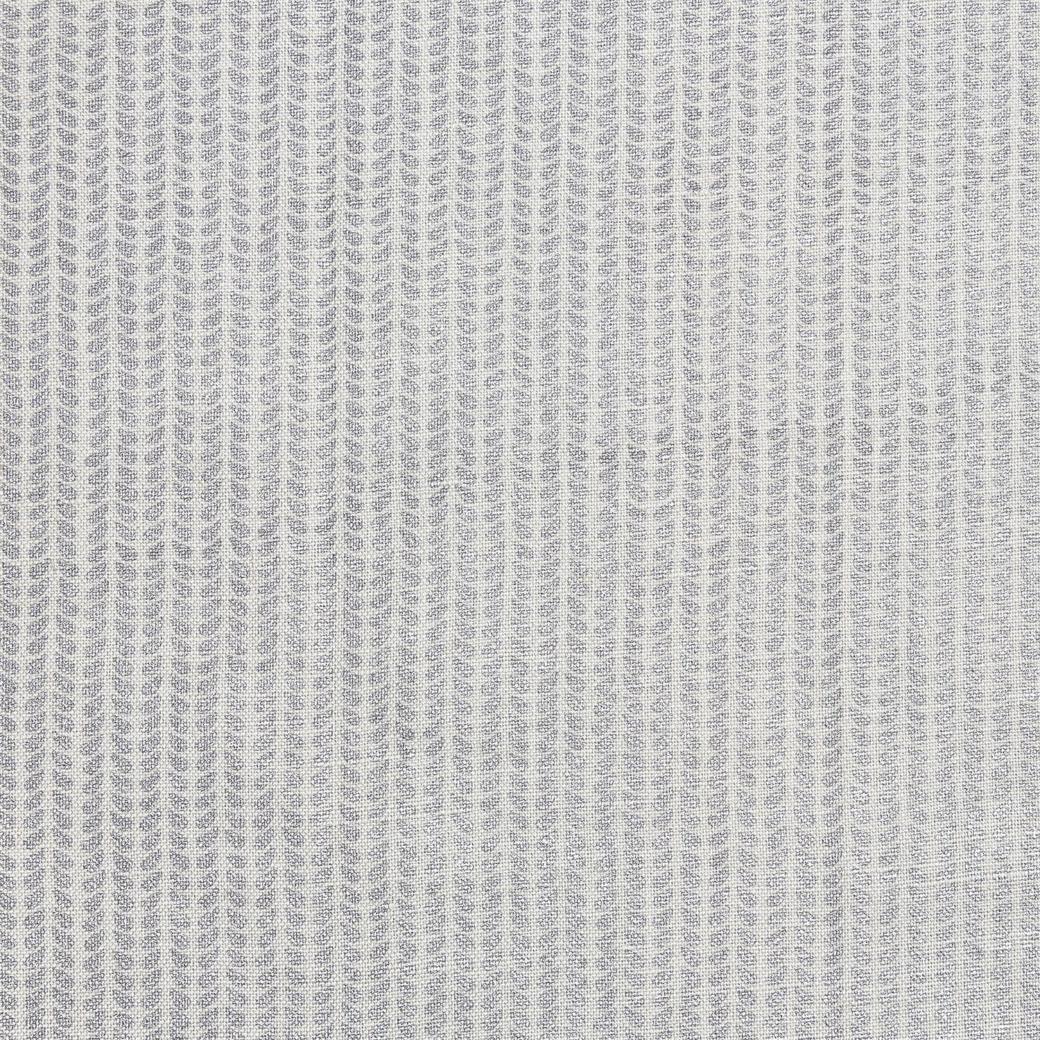 A close up image of a hand block printed John Robshaw Aleppo Silver Fabric skillfully created by artisans.