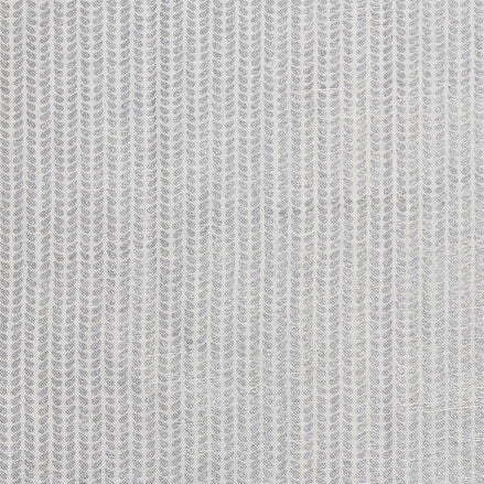 A close up image of a hand block printed John Robshaw Aleppo Silver Fabric skillfully created by artisans.