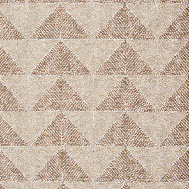 A beige and tan John Robshaw Farzu Sand Performance Fabric rug with triangles on it.