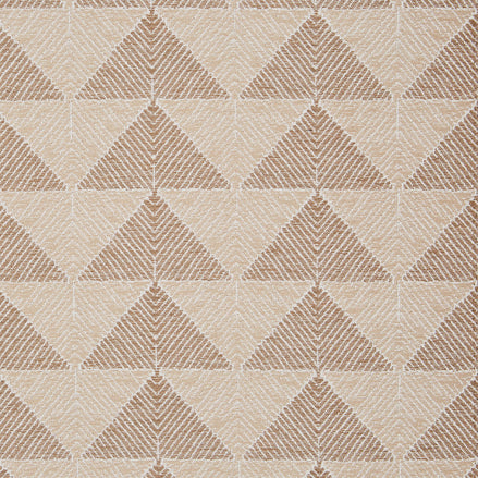 A beige and tan John Robshaw Farzu Sand Performance Fabric rug with triangles on it.