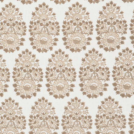 A beige and brown paisley pattern, featuring block prints is showcased on the Lanka Sand Performance Fabric by John Robshaw.