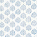This Mali Light Indigo Fabric by John Robshaw showcases a beautiful blue and white tree pattern on a crisp white background, highlighting the traditional craftsmanship involved in creating this design.