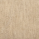 A close up of a Woven Sand Kidney Pillow with tassels on a beige fabric background made of cotton and linen by John Robshaw. - 29995583242286