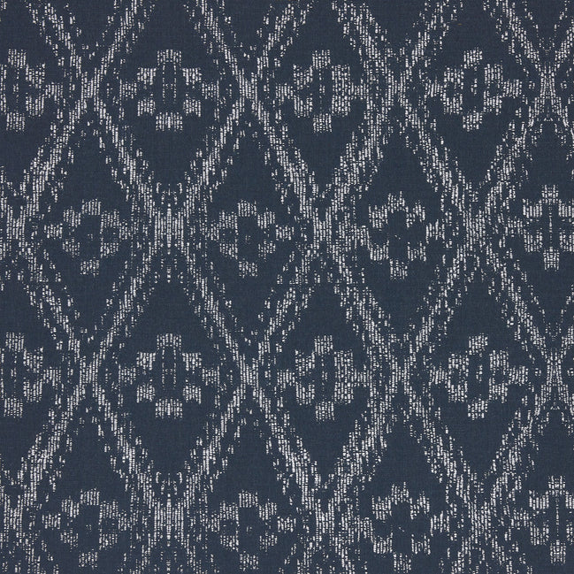 A blue and white Ramati Azure Performance Fabric with a diamond pattern, inspired by Thai ikats, by John Robshaw.