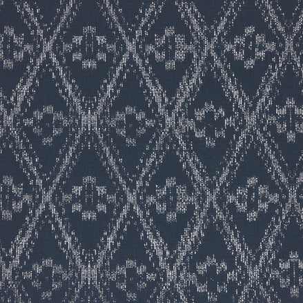 A blue and white Ramati Azure Performance Fabric with a diamond pattern, inspired by Thai ikats, by John Robshaw.
