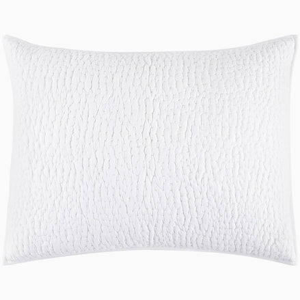 An Organic Hand Stitched White Quilt from John Robshaw with a cotton voile coverlet on a white background.