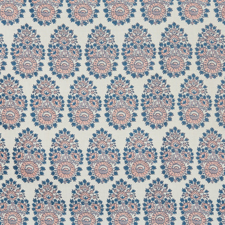 A blue and pink paisley pattern that showcases the Lanka Primrose Performance Fabric by John Robshaw, which highlights fabric-making traditions.