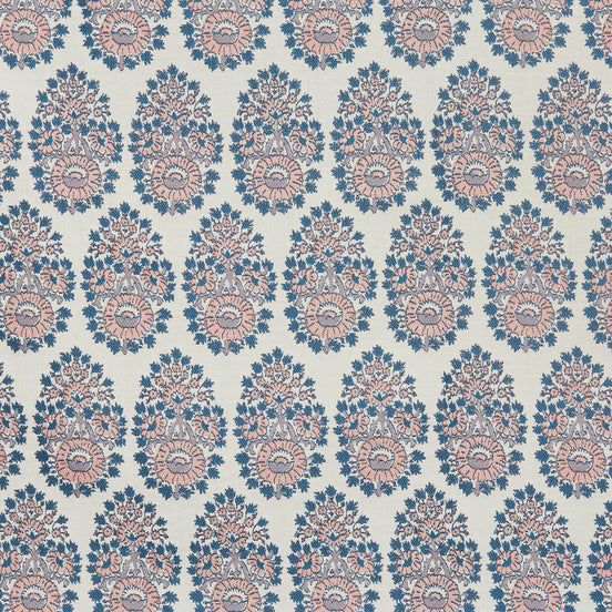 A blue and pink paisley pattern on a white background that showcases the Lanka Primrose Performance Fabric by John Robshaw, which highlights fabric-making traditions.