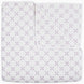 A Layla Lavender quilt by John Robshaw, made from cotton voile, with a cross pattern in white and purple, inspired by Mughal gardens.