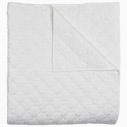 A Layla White Quilt by John Robshaw on a white background.