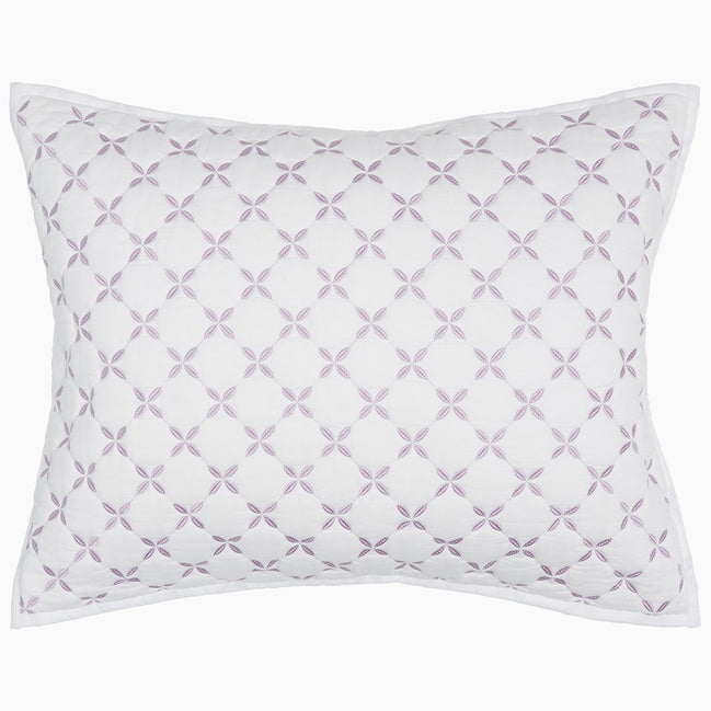 A Layla Lavender Quilt pillow with a cross design, made from cotton voile, by John Robshaw.